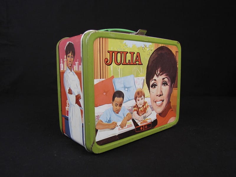 A lunch box featuring the TV show Julia