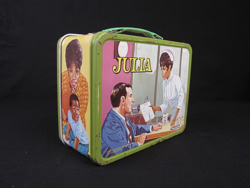 A lunch box featuring the show Julia