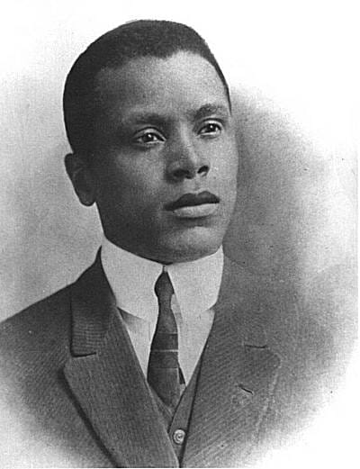 A black and white photo of the filmmaker Oscar Micheaux, circa 1913
