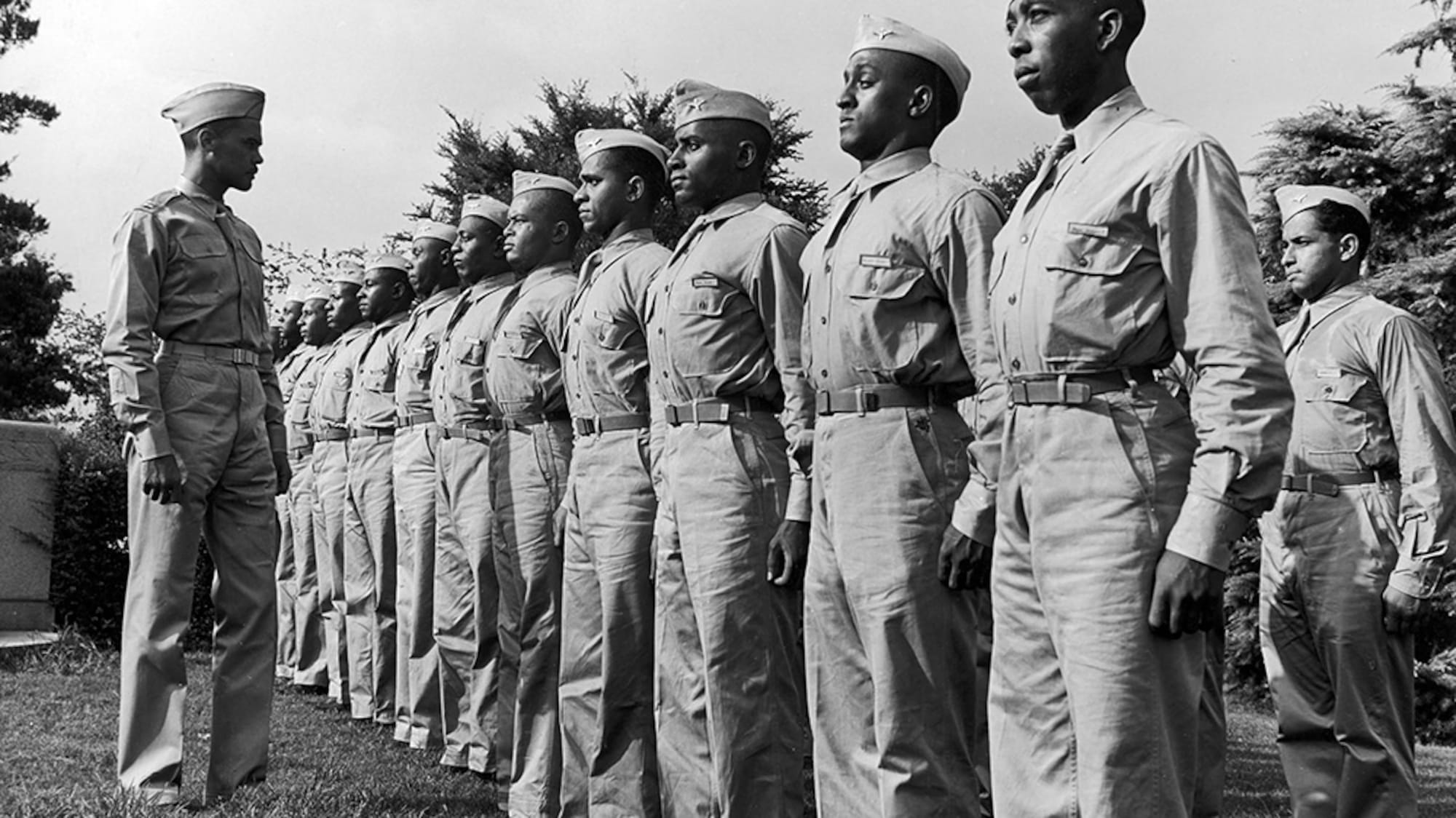 Benjamin O. Davis, Jr., reviews cadets under his command at Tuskegee Army Air Field in 1942.