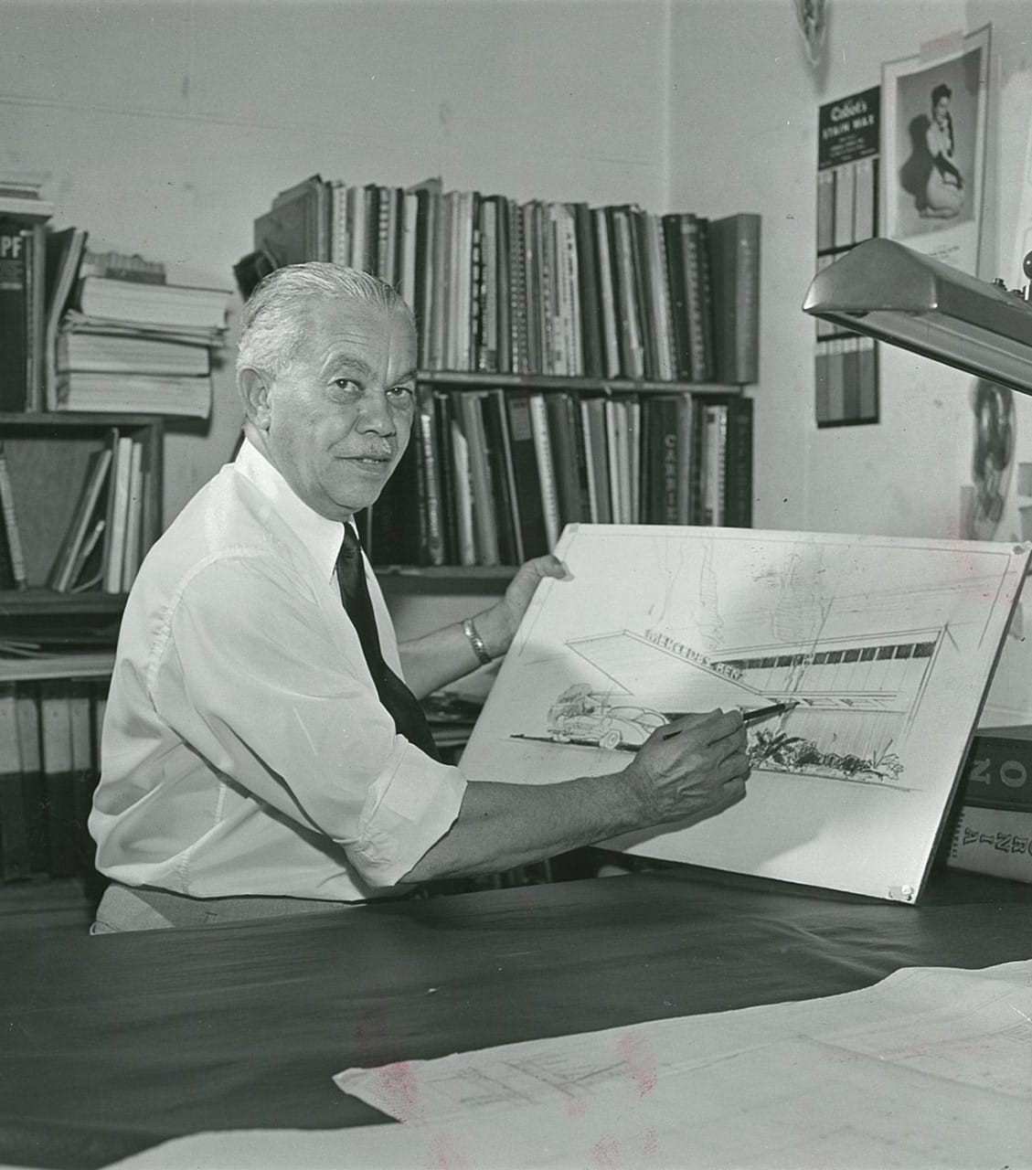 Paul R. Williams with an architectural drawing. Courtesy of Getty Images.