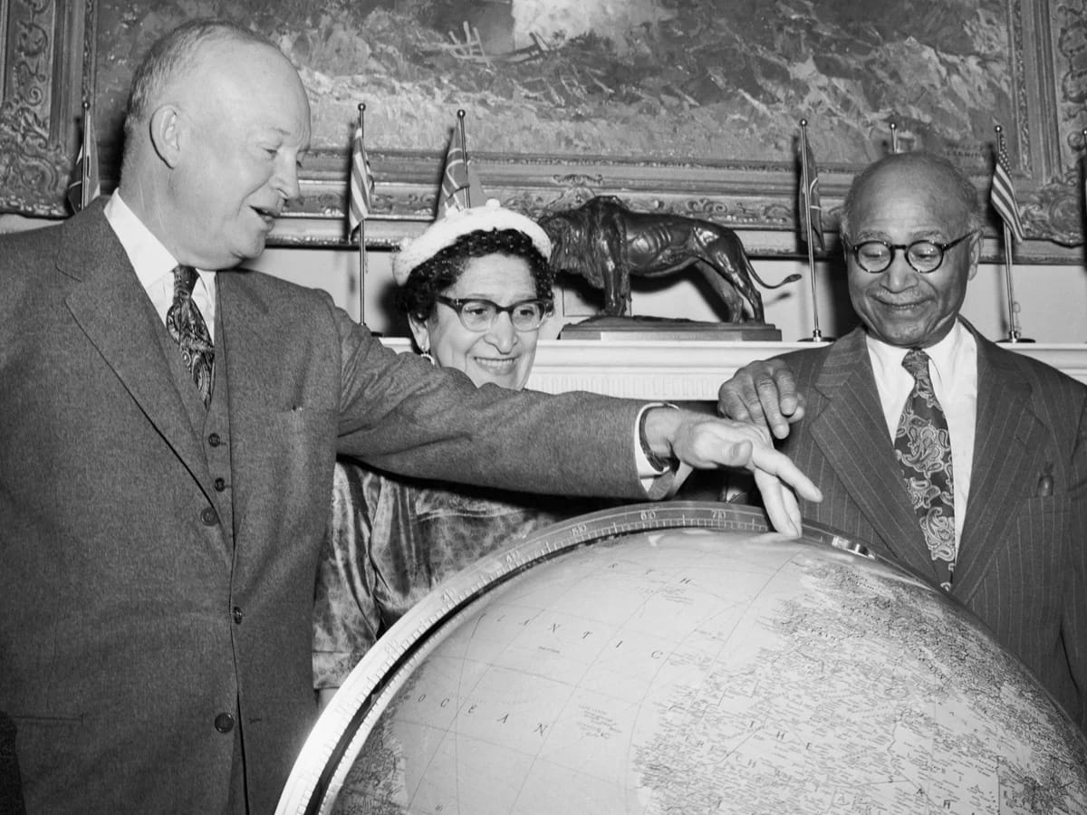 Matthew Henson at the White House in 1954 with his wife, and President Dwight Eisenhower.