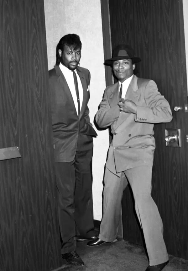 Jimmy Jam and Terry Lewis pose in the "Right On!" Magazine office. 1982. Photo by Michael Ochs Archives/Getty Images.