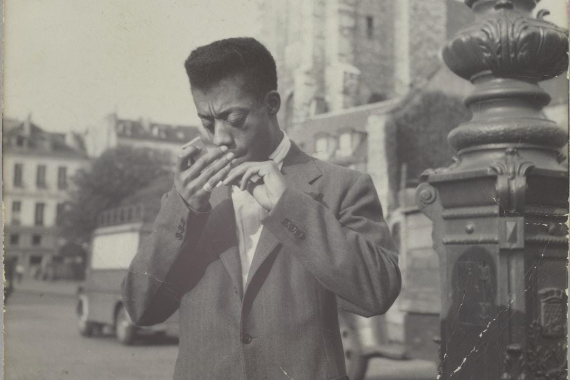James Baldwin smoking in Paris.